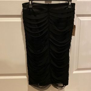 Mandalay black silk overlay and spandex skirt.